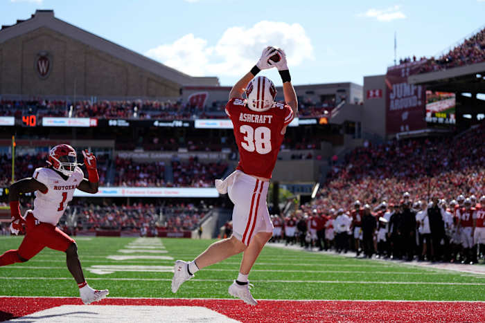 Oct 7, 2023; Madison, Wisconsin, USA; Wisconsin Badgers tight end Tucker Ashcraft (38) catches a pass to score a touchdown during the fourth quarter against the Rutgers Scarlet Knights at Camp Randall Stadium. Mandatory Credit: Jeff Hanisch-USA TODAY Sports